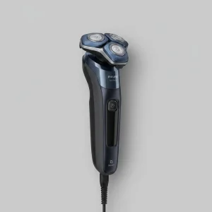 ماشین اصلاح موی صورت فیلیپس مدل S7885 با تیغه چرخشی 360 درجه استیل پیشرفته، قابلیت استفاده خشک و مرطوب، تکنولوژی Skin IQ و Power Adapt برای تنظیم خودکار سرعت، شارژ سریع 5 دقیقه‌ای و ضدآب بودن با امکان استفاده زیر دوش